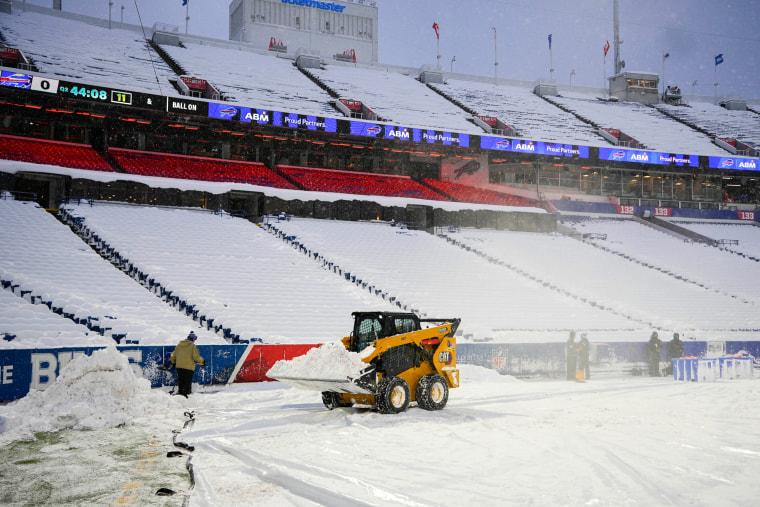 Buffalo Bills 'mafia' works through the night to clear snow at Highmark Stadium